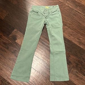 Size 25 tag jeans. Olive Green. Great condition.
